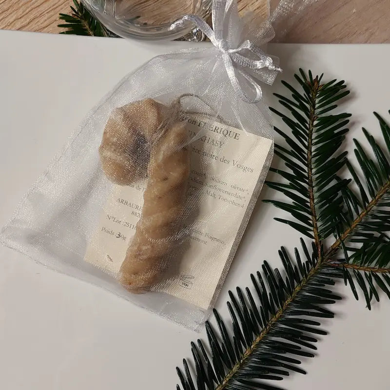 Savon en forme de sucre d'orge dans une assiette